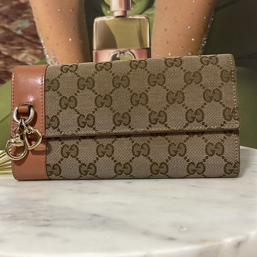 Gucci Guccisima canvas + Leather + charms